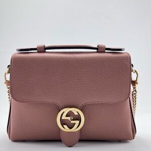 Authentic Gucci Mauve Leather Crossbody Bag with Gold Accent